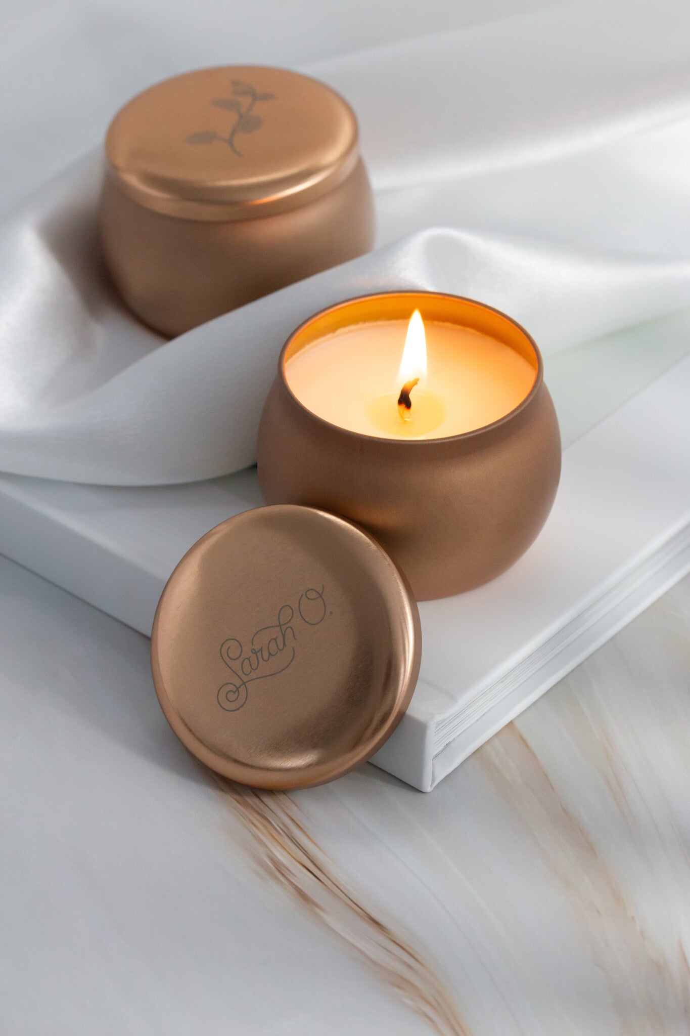 Sarah O. Signature Scent Tin Candle