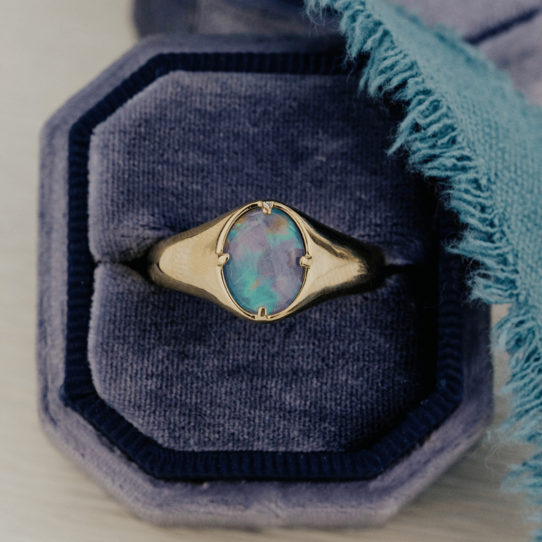 Opal Triplet Signet ring in velvet ring box.