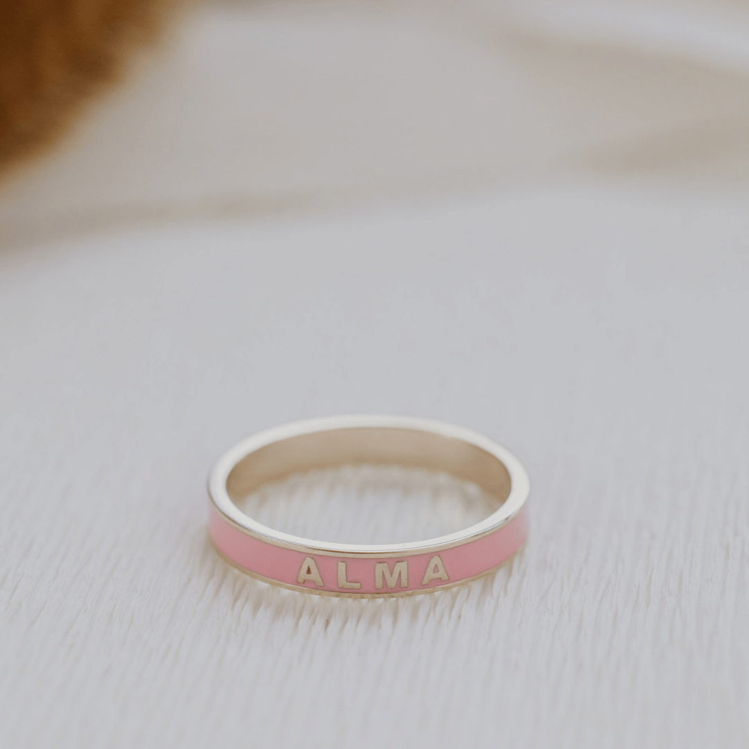Pink customizable enamel gold ring.