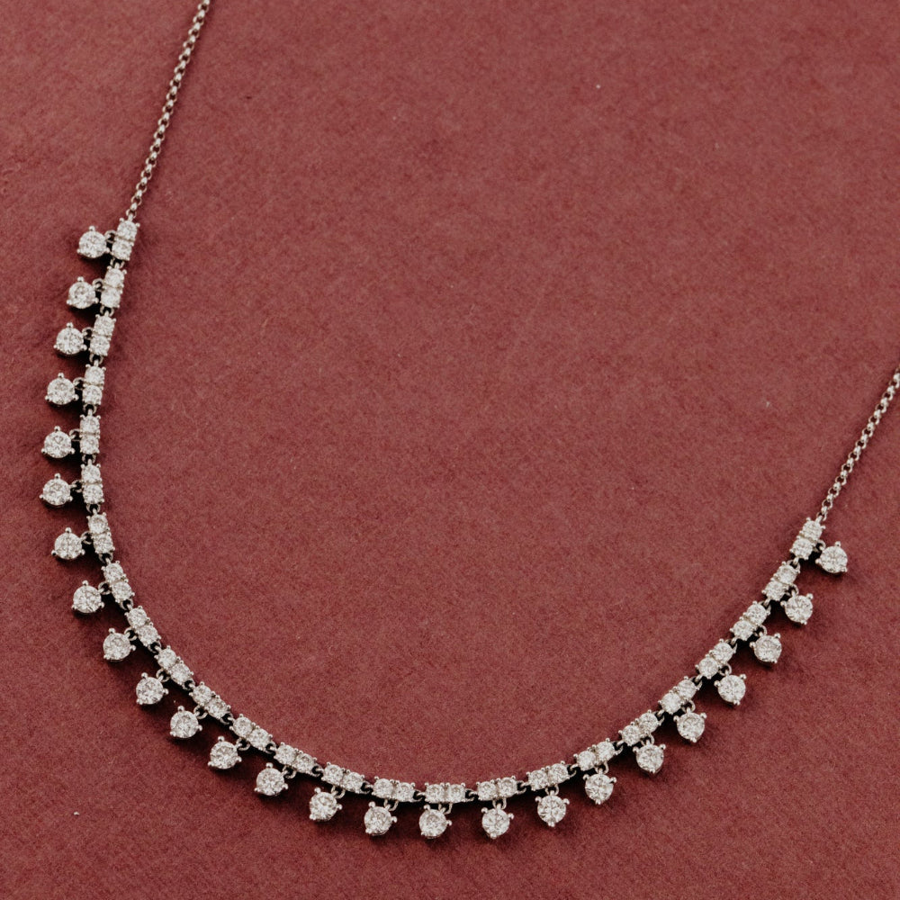 Diamond necklace on a red background.