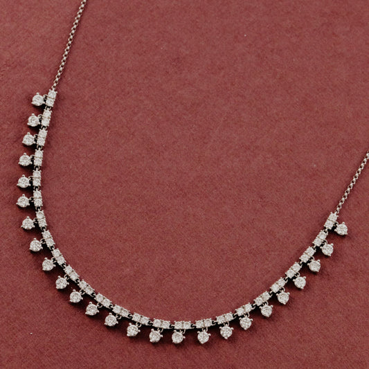 Diamond necklace on a red background.