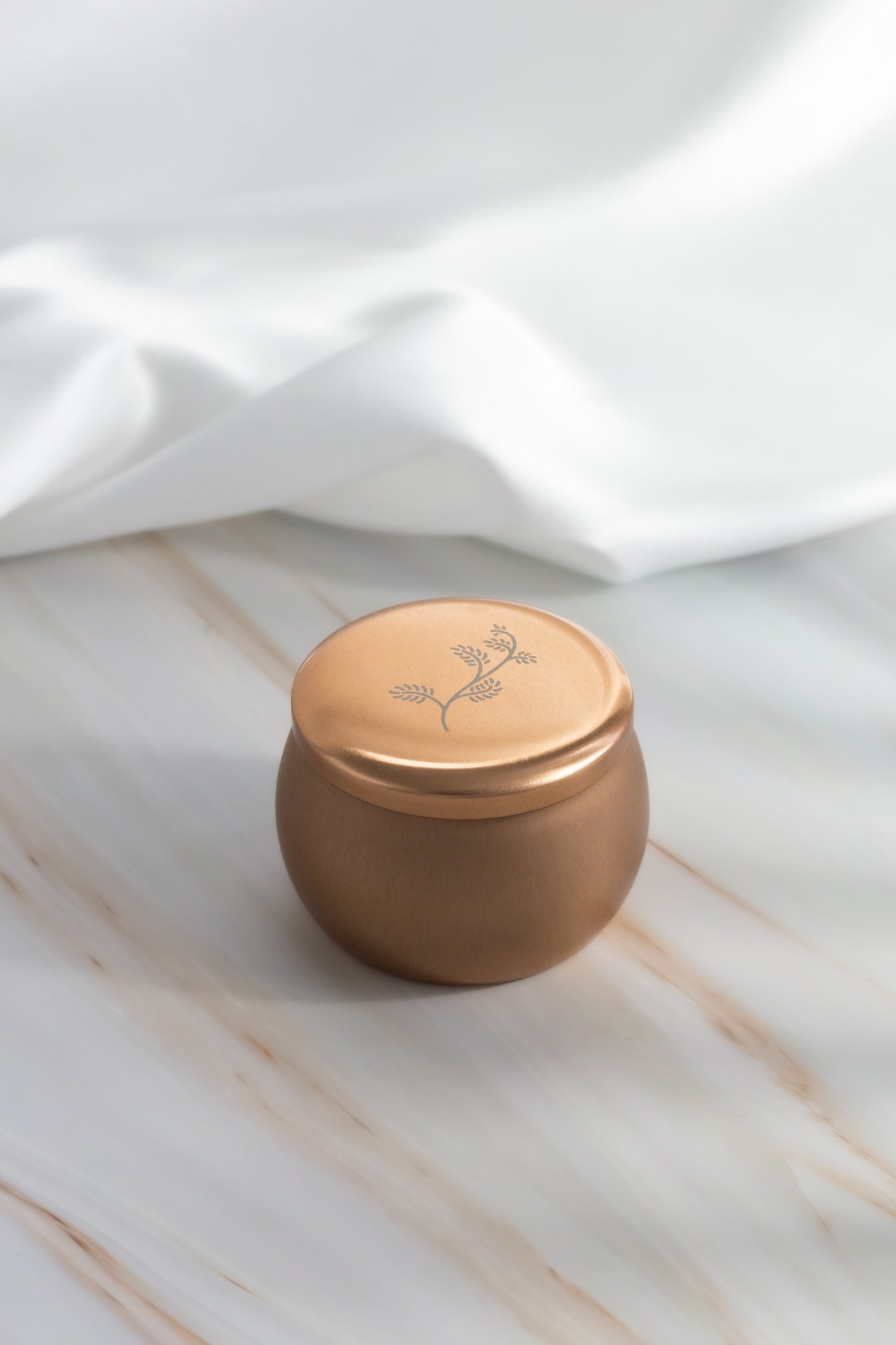 Sarah O. Signature Scent Tin Candle