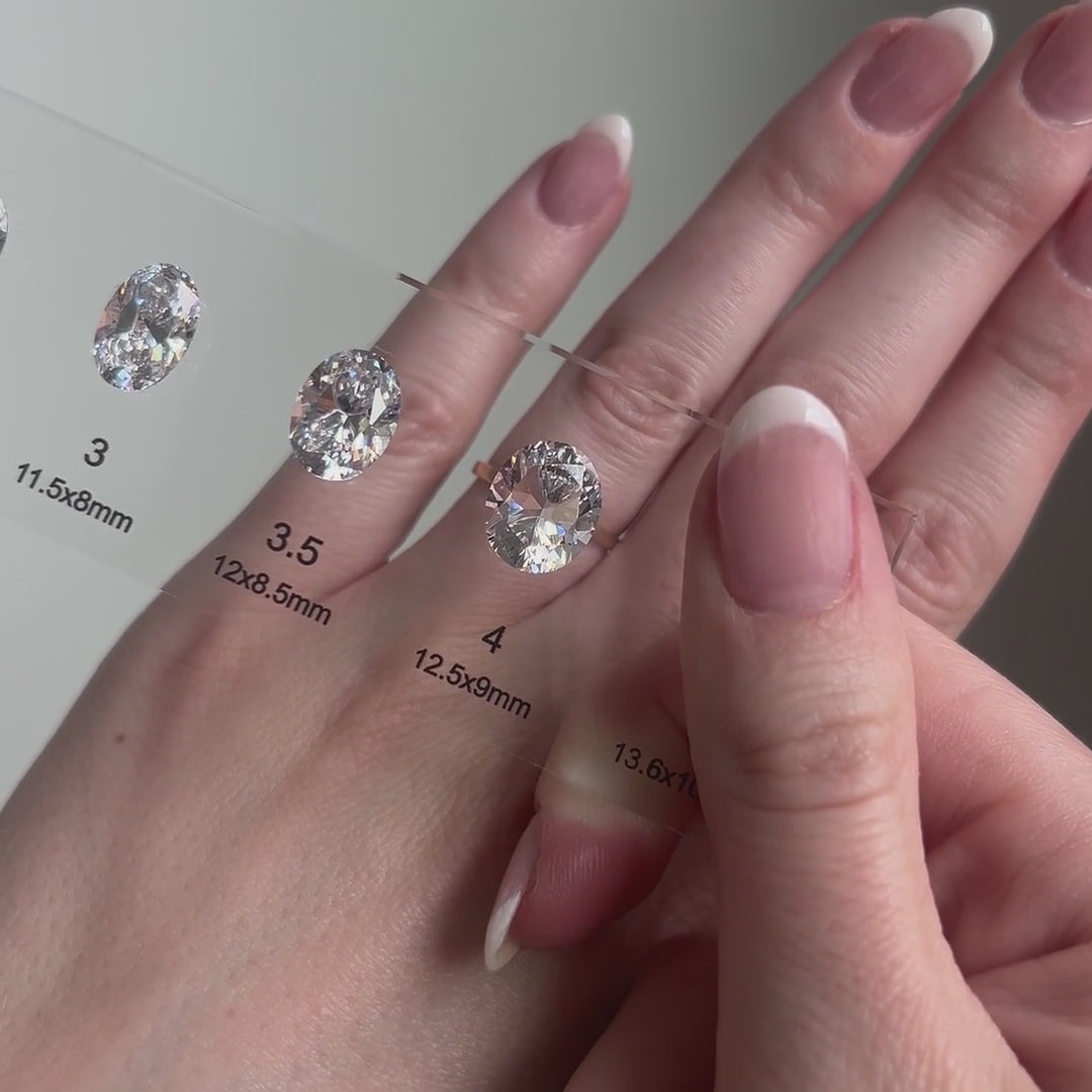 Video showcasing different carat weights displayed on a model's hand.