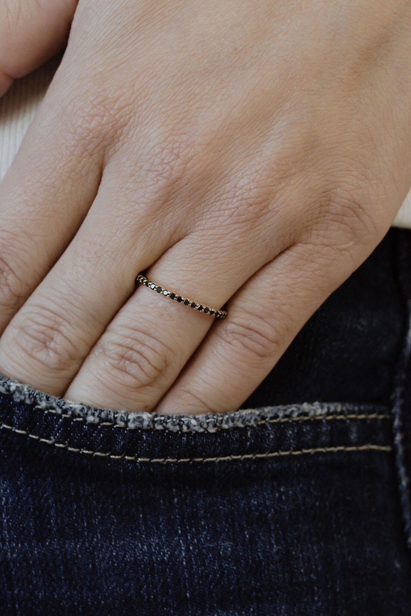 The Jenna Black Diamond Band on a models hand