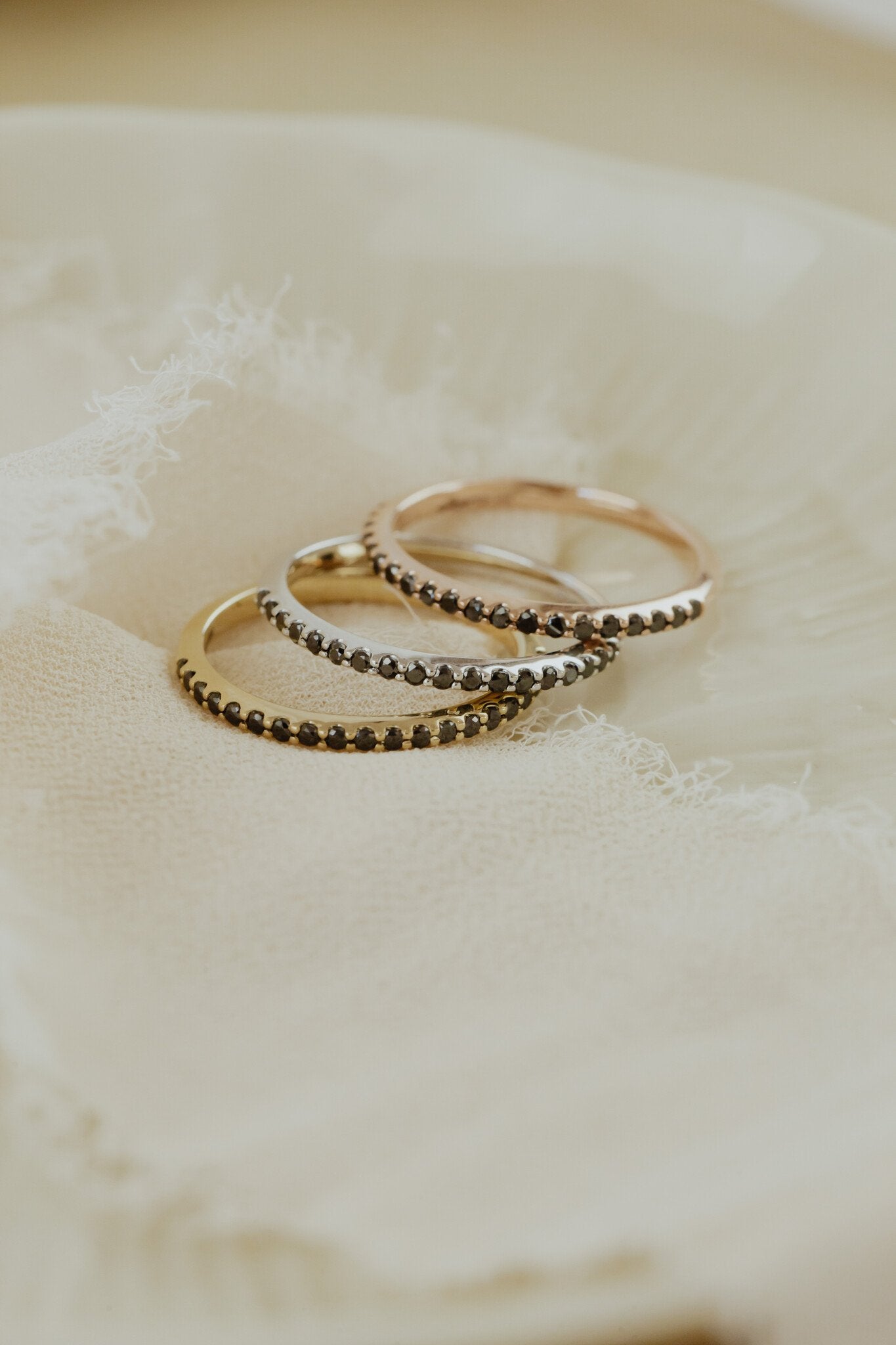 The Jenna Black Diamond Band in 14k yellow, white, and rose gold