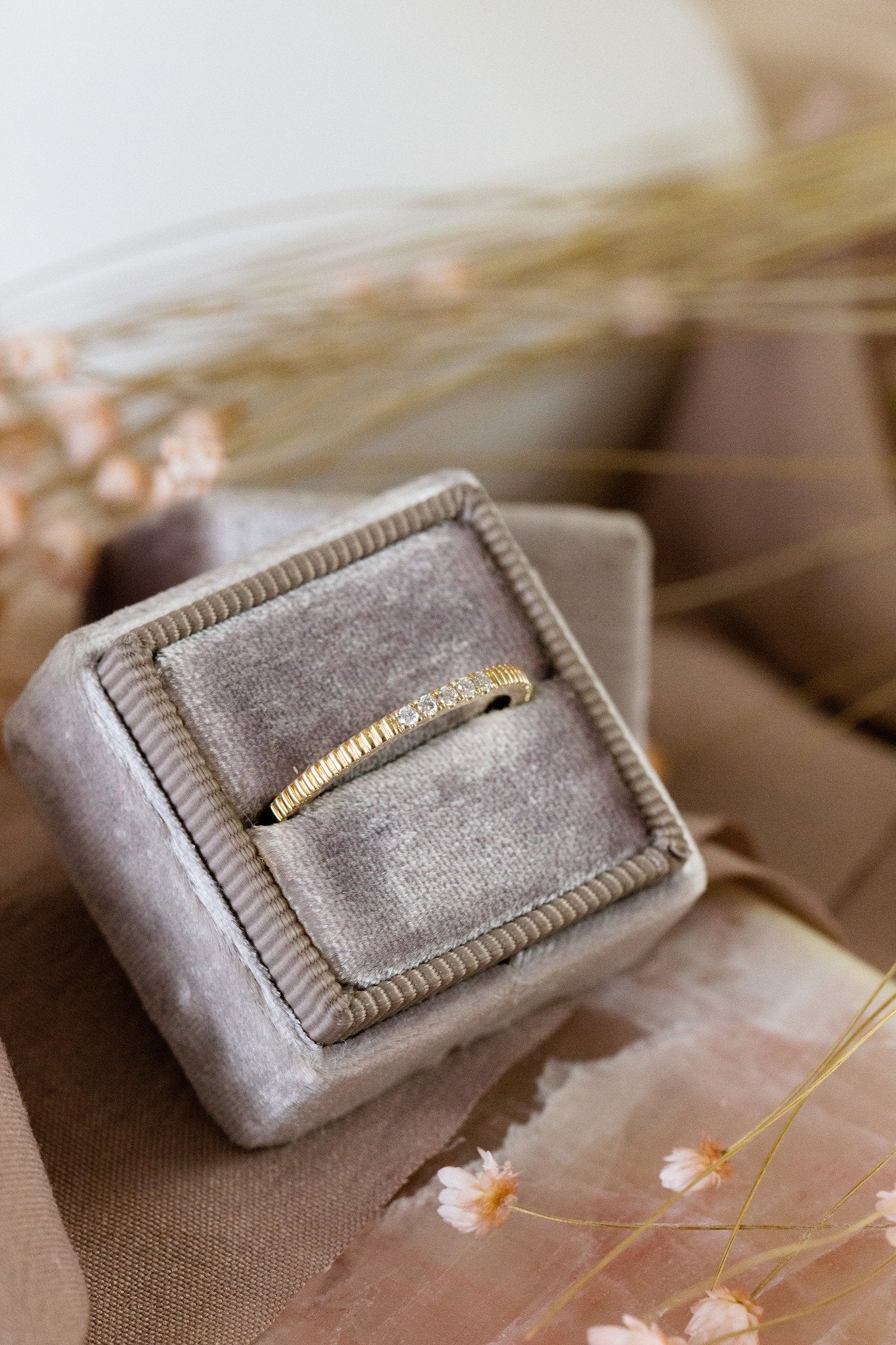 The Jane Diamond Band in 14k yellow gold in a Sarah O Jewelry velvet ring box