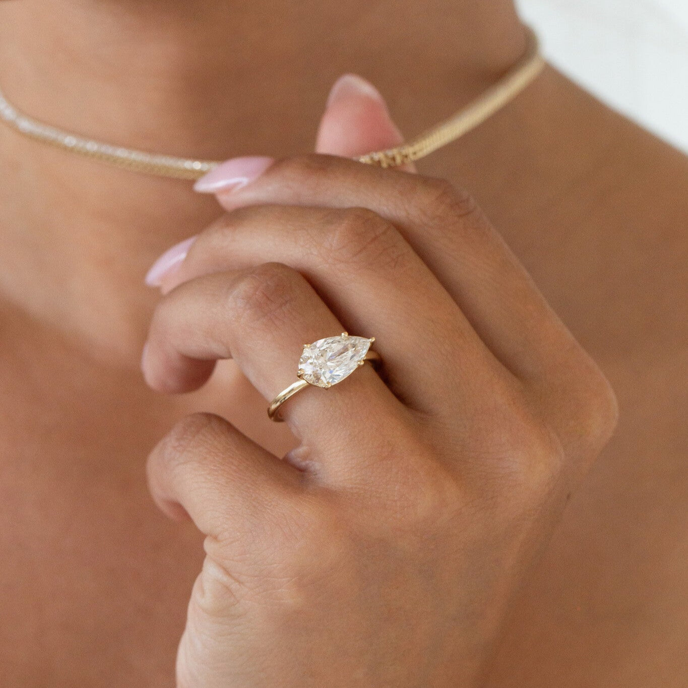 The Bennett pear engagement ring in 14k yellow gold