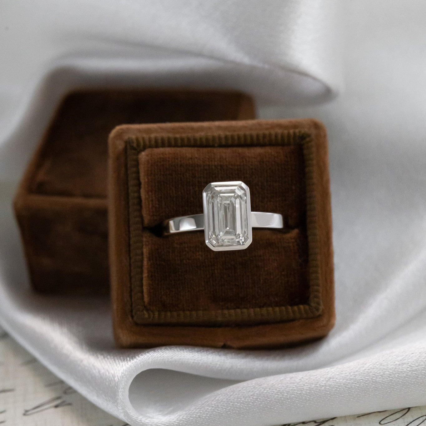 The Elena emerald cut solitaire engagement ring