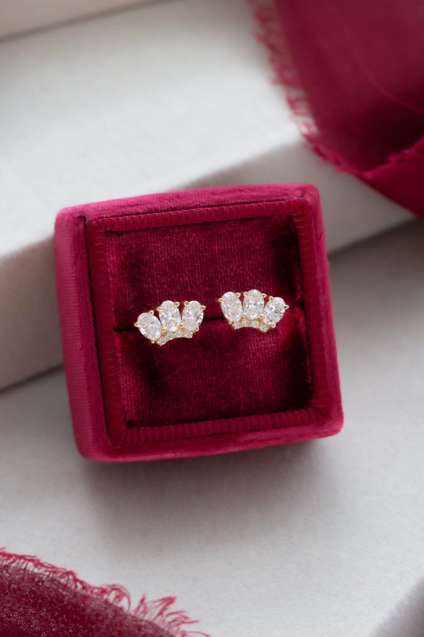 Three Oval Diamonds with Curved Diamond Bar Earrings