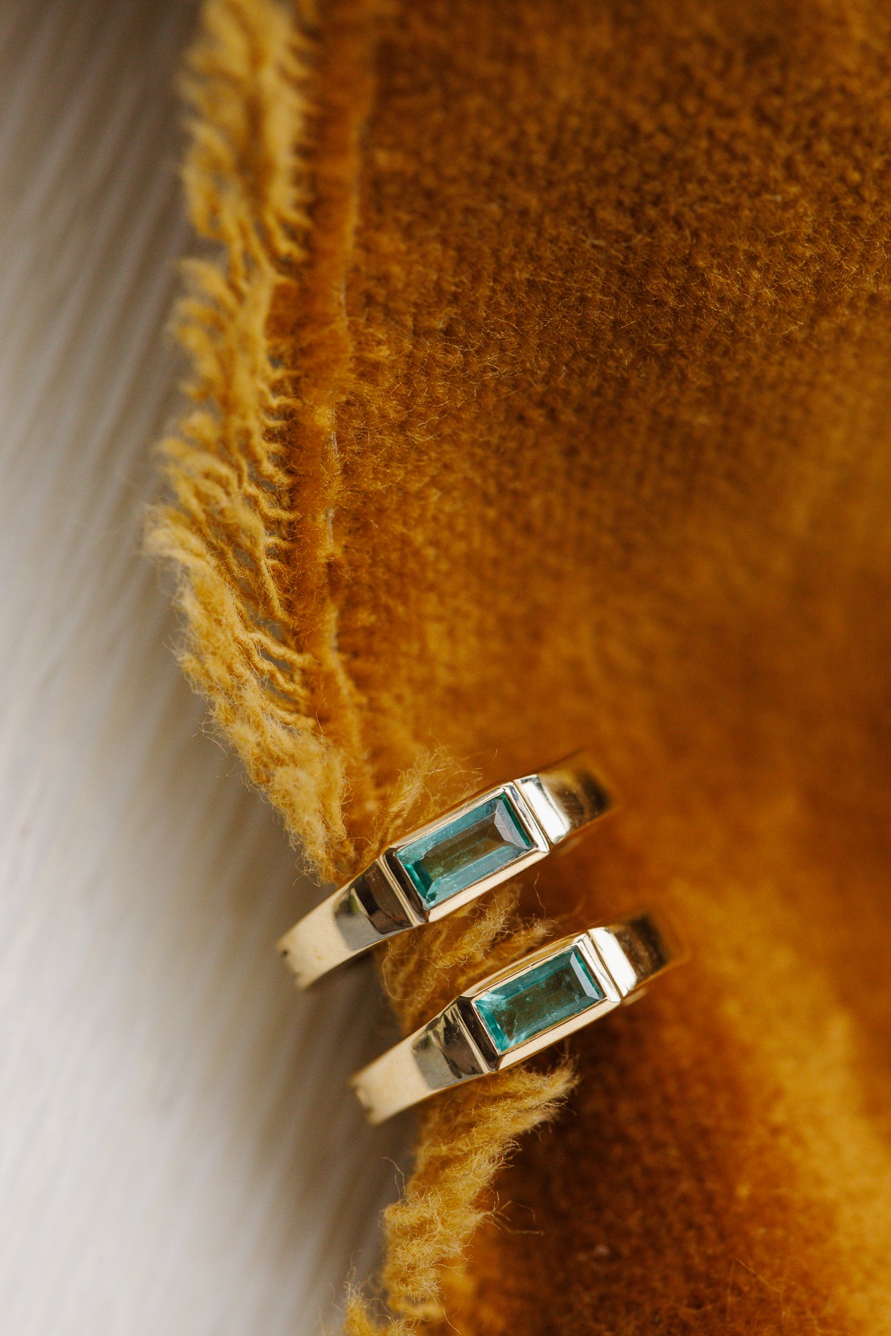 Baguette Emerald on Huggie Hoop Earrings